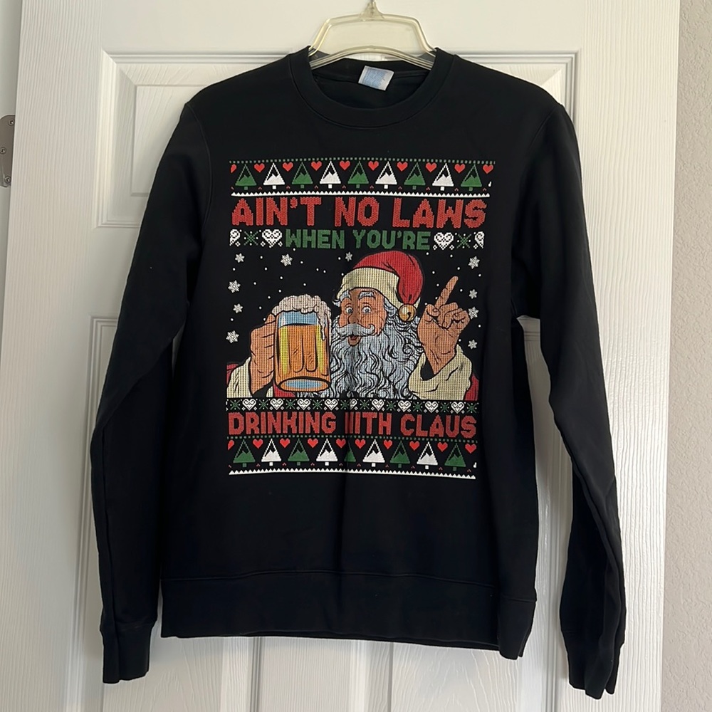 Ain’t no laws when you’re drinking with Claus tacky Christmas sweater!